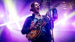 Hozier singing at the Kia Center in Orlando Florida.