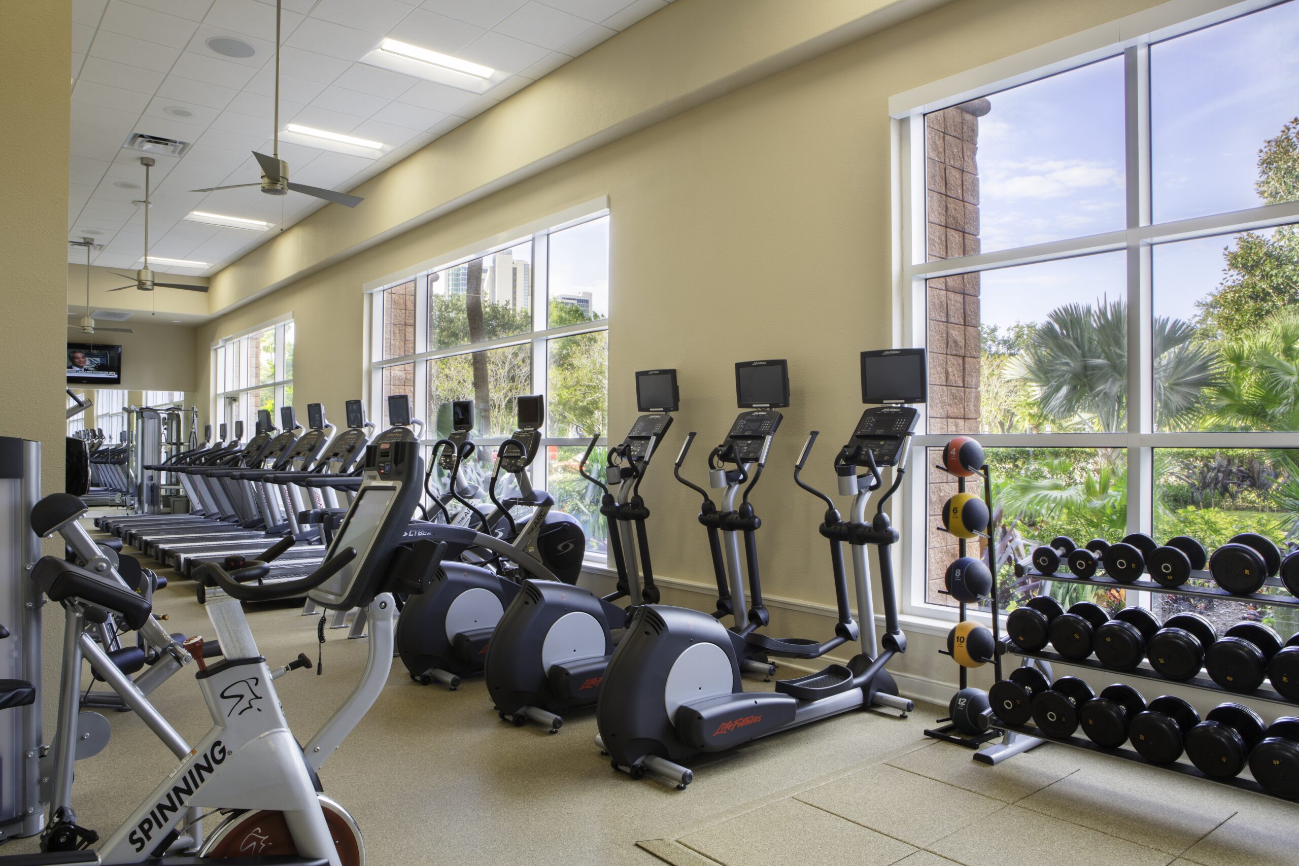 Gym at Rosen Centre. Working out can help you sleep better while traveling.