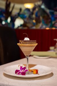 You don’t have to go far to satisfy your sweet tooth; try the 50th Anniversary Dessert, Espresso Panna Cotta Martini, at Everglades.