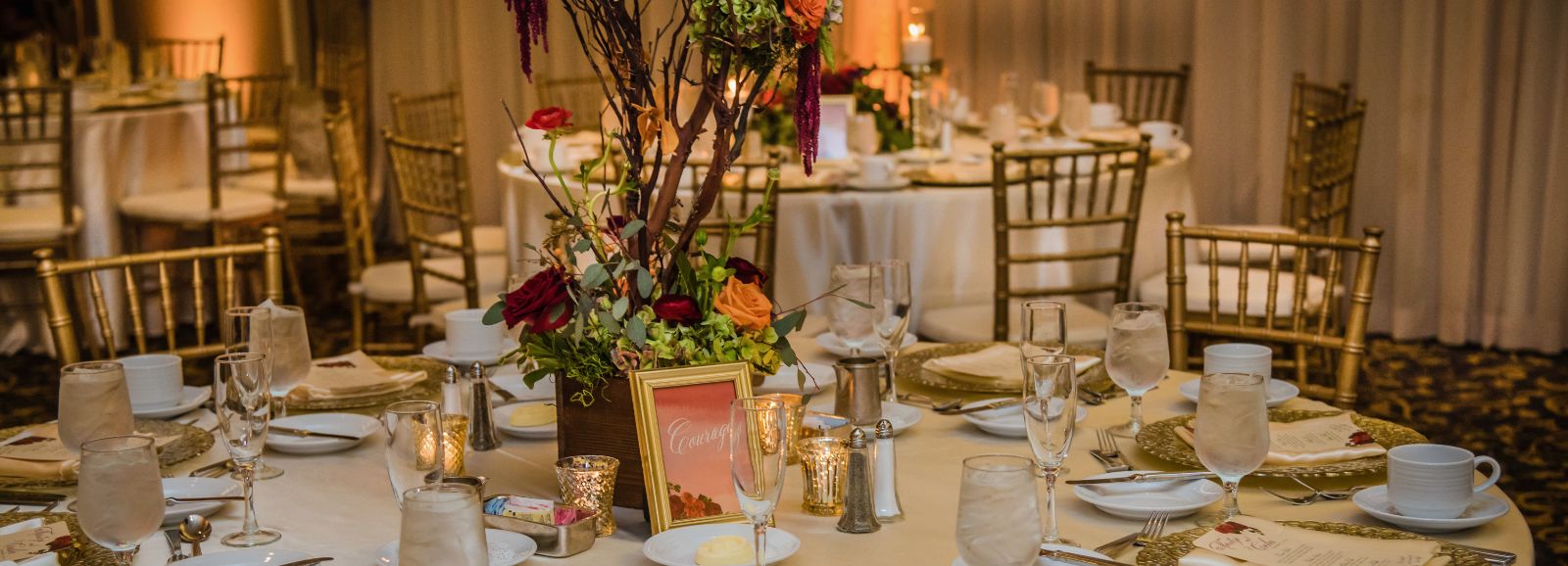 Gold, Cream, and Red Table Setting